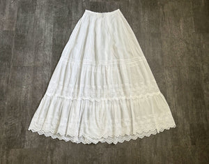 Antique embroidered petticoat . vintage white skirt . size xs