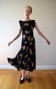 1930s black floral print bias cut dress . size xs to small