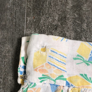 1930s feedsack pants . vintage novelty print pants . size medium