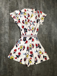 1940s rayon jersey playsuit . vintage floral romper . size xs to s