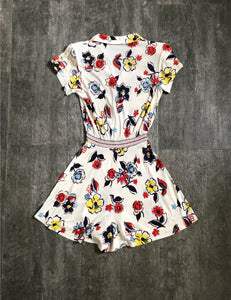 1940s rayon jersey playsuit . vintage floral romper . size xs to s