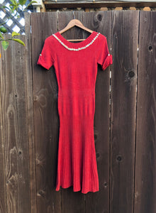 1950s knit dress . 50s pink knit dress . size xs to medium